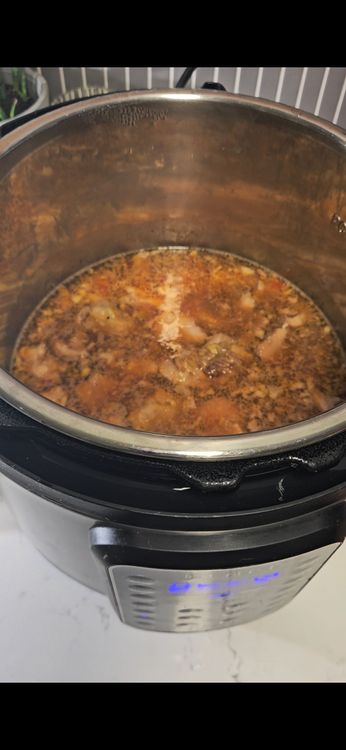 Step 1.1: Add chicken, garlic, ginger, chili paste, soy sauce, honey, sesame oil, and chicken bone broth to a slow cooker