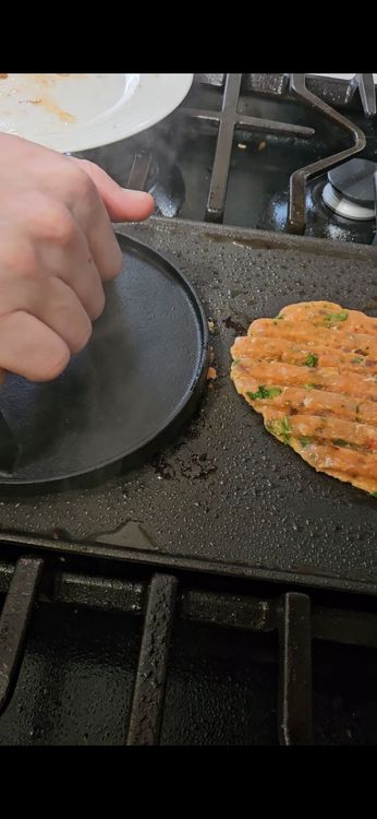 Step 3.1: Smash the ball with a burger press or spatula to form a patty