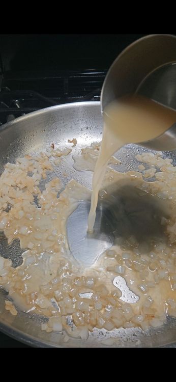 Step 1.1: Pour in the chicken broth and simmer for another 3 minutes to intensify the flavor