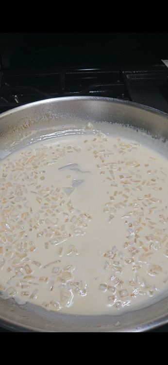 Step 1.2: Reduce the heat to low and stir in the heavy cream
