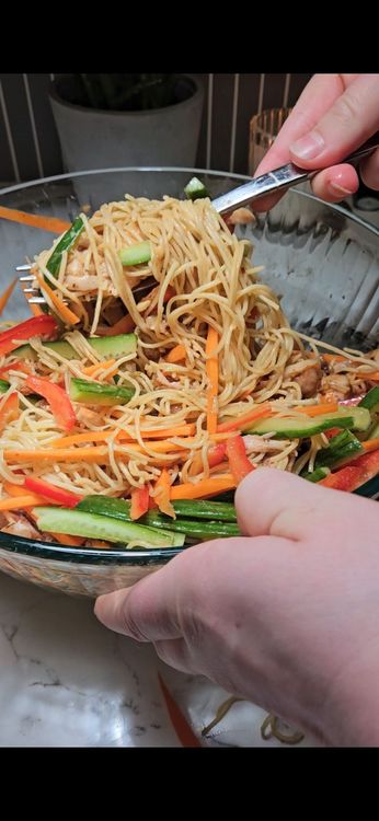 Step 1.2: Pour the prepared dressing over the noodle mixture and toss to coat evenly