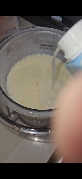 Step 1.1: Once frozen, add a bit of almond milk, place the container into the Ninja Creami and process on the ice cream setting