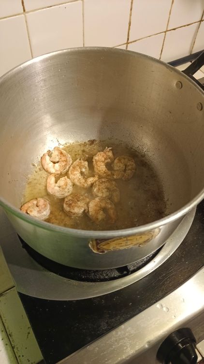 Step 1.4: Cook the shrimps in butter and set aside when done