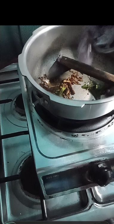 Step 2.2: Add the chopped onion, garlic, and ginger to the pan