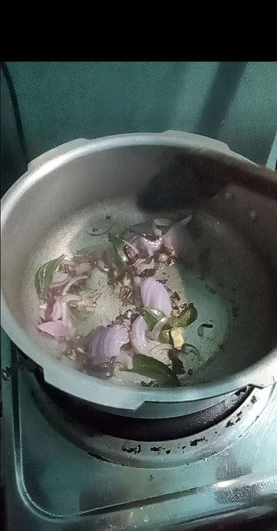 Step 2.5: Add the chopped onion, garlic, and ginger to the pan