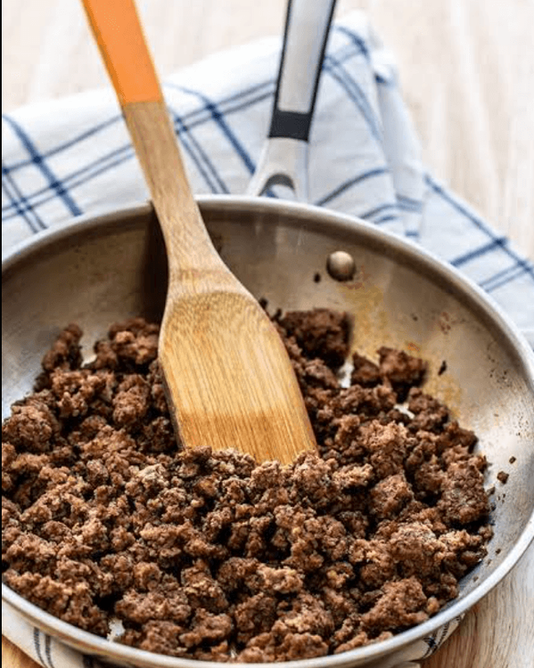 Step 1.1: Heat 2 tablespoons of oil in a large skillet over medium heat