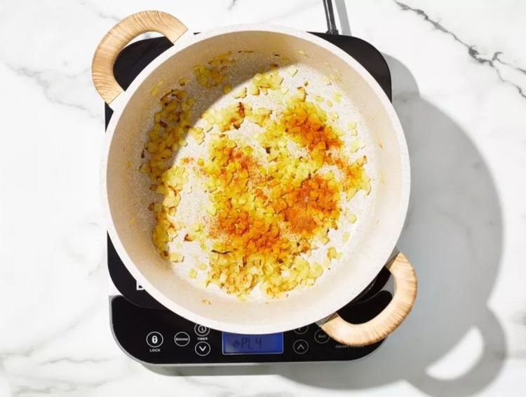 Step 1.1: Heat 2 tablespoons of oil in a large pot over medium-high heat