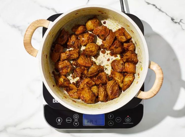 Step 1.1: Add the chuck cubes and cook until coated in turmeric and browned on all sides, about 8 to 10 minutes