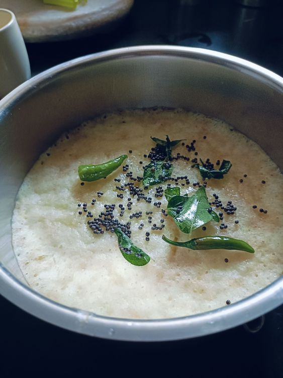 Step 1.1: Now for the tempering, put two teaspoons of oil in a small saucepan