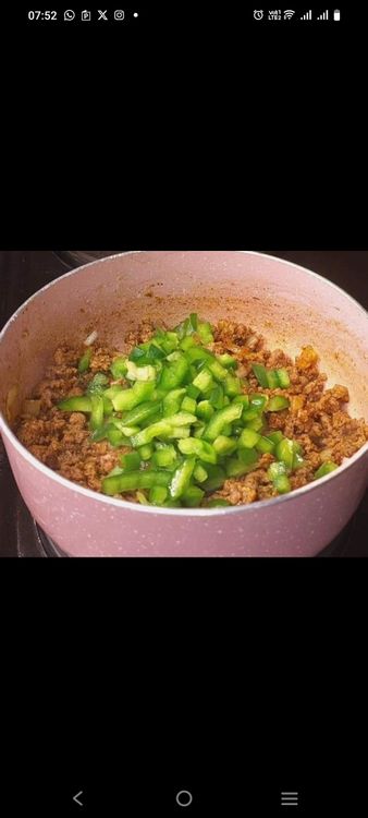Step 1.4: Add chopped onion and green pepper, and sauté until soft
