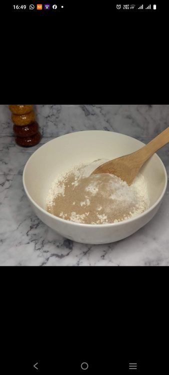 Step 1.1: In a large bowl, combine the flour, salt, sugar, and yeast