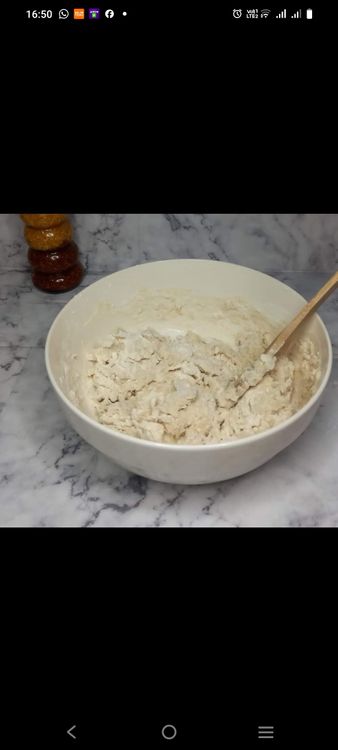 Step 1.3: Add the oil and warm milk to the dry ingredients and mix until a dough forms