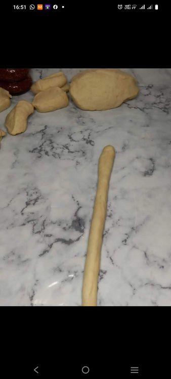 Step 2.2: Roll each piece of dough into a rectangle and wrap it around a vienna sausage