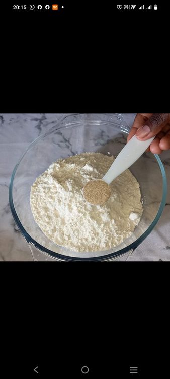 Step 1.2: In a large bowl, combine the flour, yeast, salt, sugar, cinnamon, and mixed spice