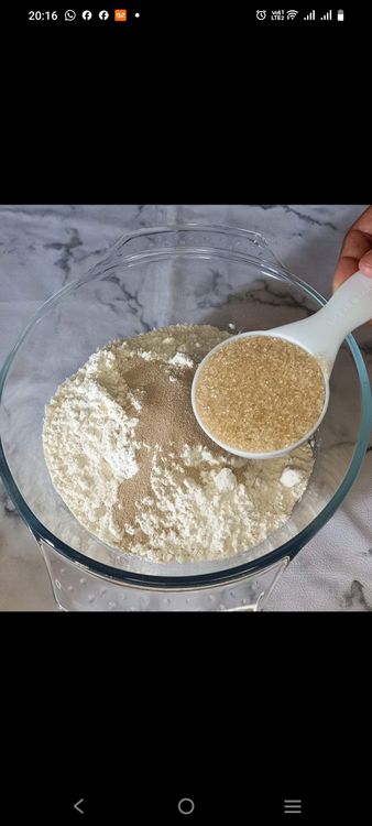 Step 1.1: In a large bowl, combine the flour, yeast, salt, sugar, cinnamon, and mixed spice