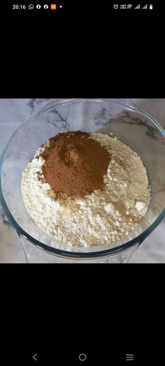 Step 1.4: Add the egg, warm milk, and melted margarine to the dry ingredients and mix until a dough forms