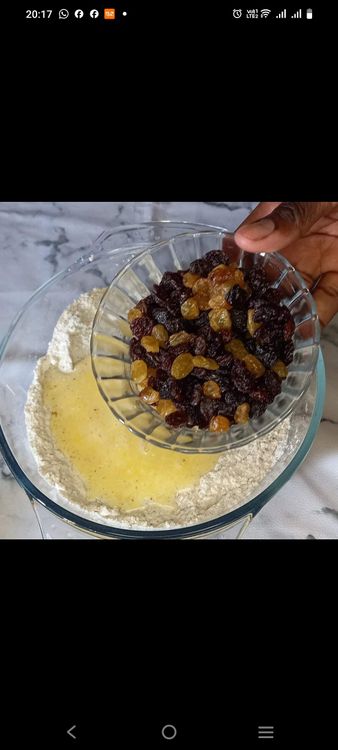 Step 1.1: Incorporate the orange zest and raisins into the dough