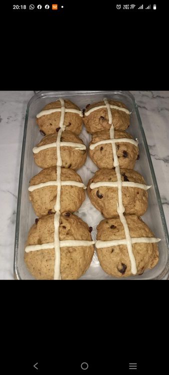 Step 2.1: Pipe the paste over the buns to form crosses