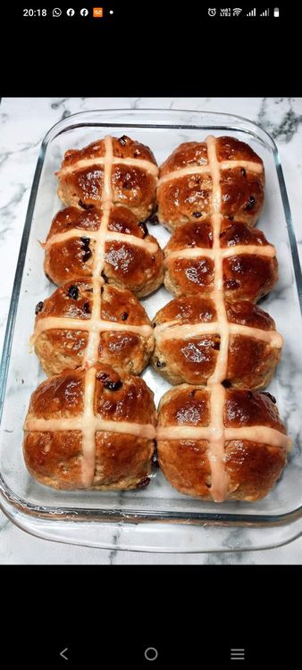 Step 3.1: Brush the warmed jam over the hot buns to give them a glaze