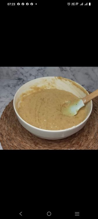 Step 1.2: Gradually add the dry ingredients to the wet ingredients, mixing until just combined