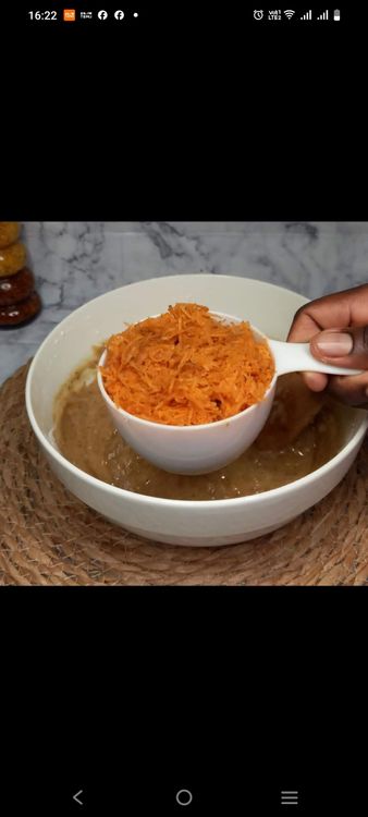 Step 1.1: Fold the grated carrots into the wet ingredients
