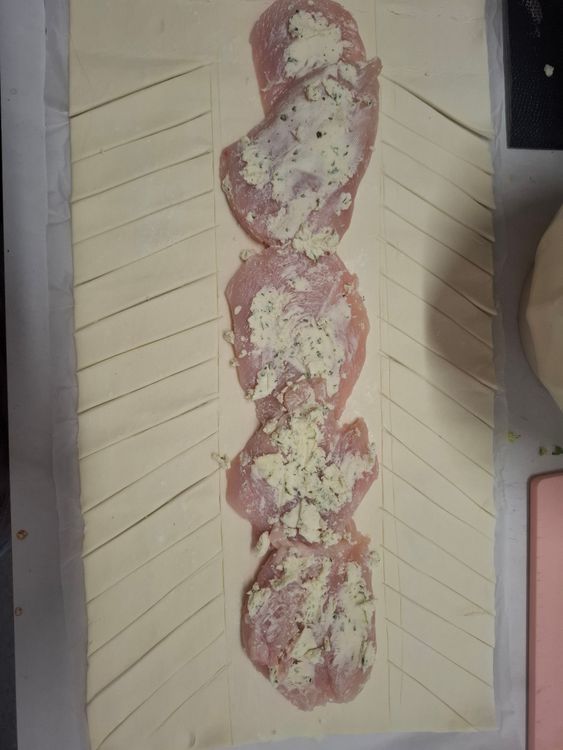 Step 1.1: Get your pastry unrolled and laid out and use the chicken to gauge the size needed in the middle to hold the breast