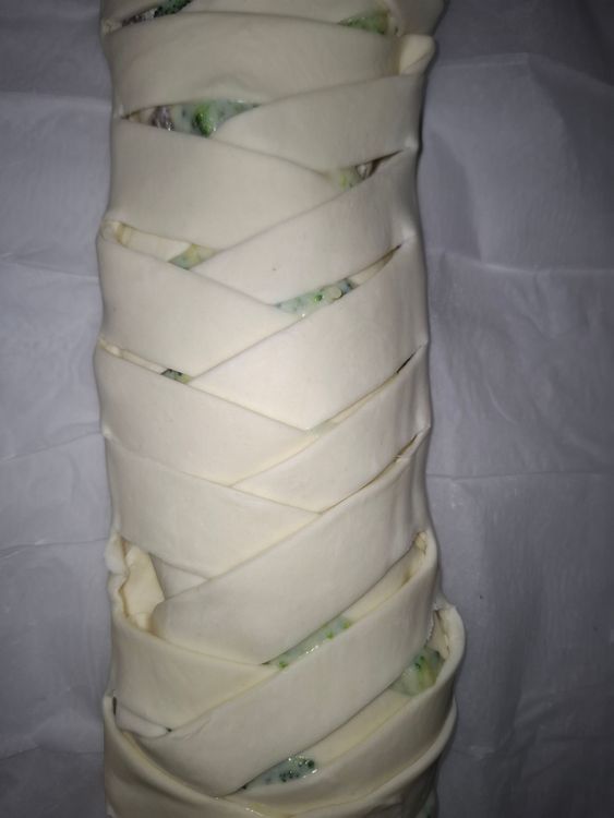 Step 1.1: Then take the second strip of pastry on one side, over to the next
