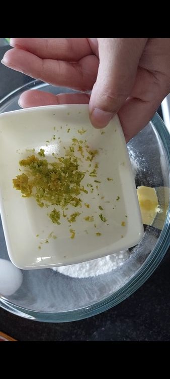 Step 1.3: In a bowl mix butter, sugar and lemon zest till creamy