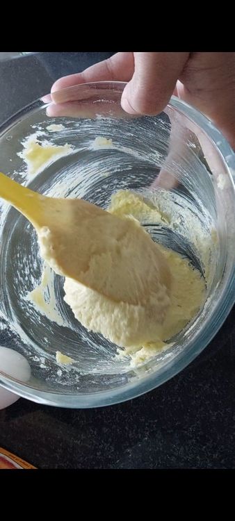 Step 1.4: In a bowl mix butter, sugar and lemon zest till creamy