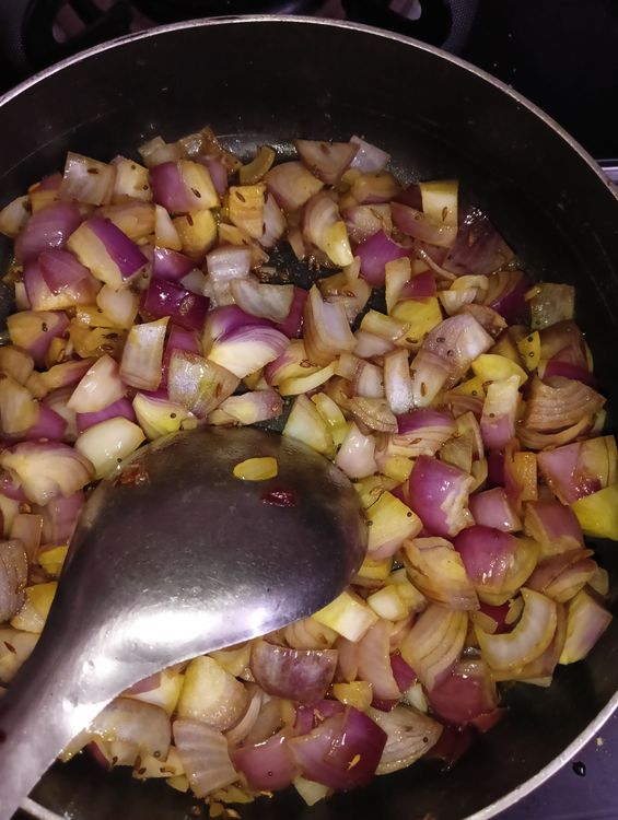 Step 1.1: Add turmeric powder and chopped onions