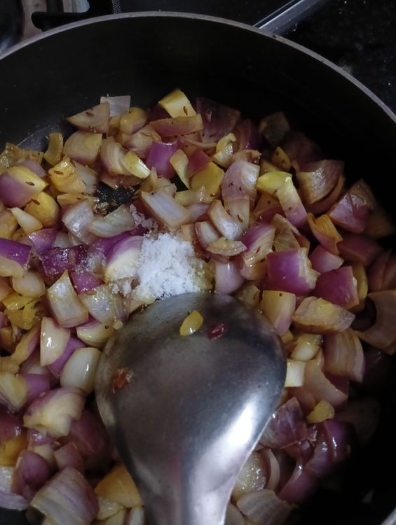 Step 1.1: Add red chilli powder and a little water for gravy