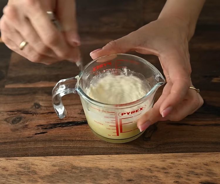 Step 1.1: In a separate bowl, combine sour cream (or a vegan alternative) with vegetable broth and flour