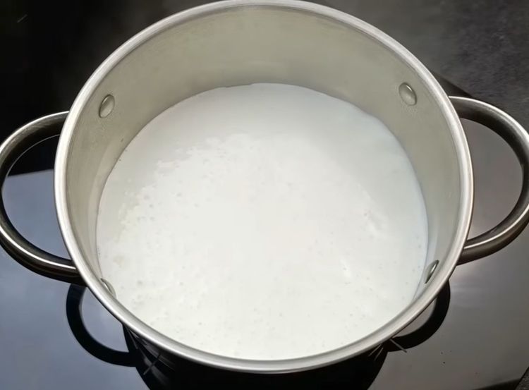 Step 2.1: In another pot, add milk and heat over medium flame until it reaches a gentle boil