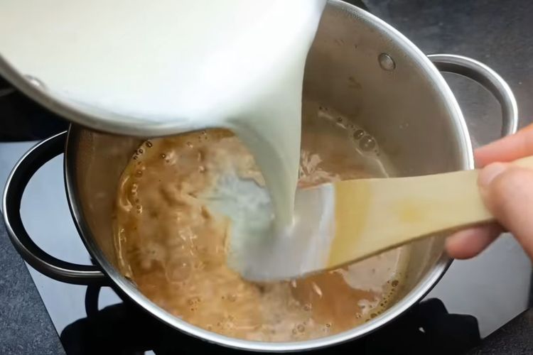Step 2.2: In another pot, add milk and heat over medium flame until it reaches a gentle boil