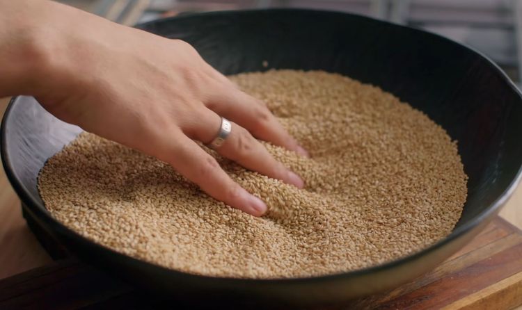 Step 1.1: Transfer to a bowl and cool completely to prevent oil release while grinding