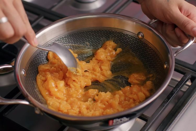 Step 3.1: Once melted, switch to very low flame and stir continuously for about 15 minutes
