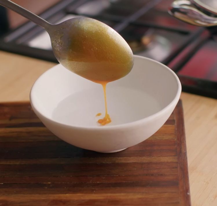 Step 3.1: Perform a consistency test by dropping a little jaggery into cold water