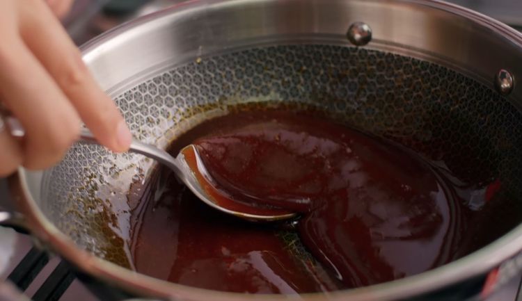 Step 3.2: Perform a consistency test by dropping a little jaggery into cold water