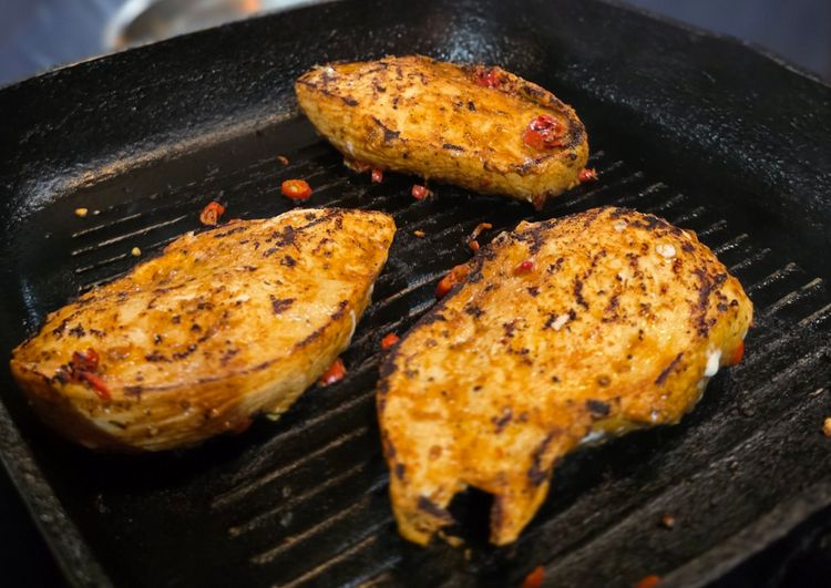 Step 1.1: Grill the chicken breasts on both sides until charred