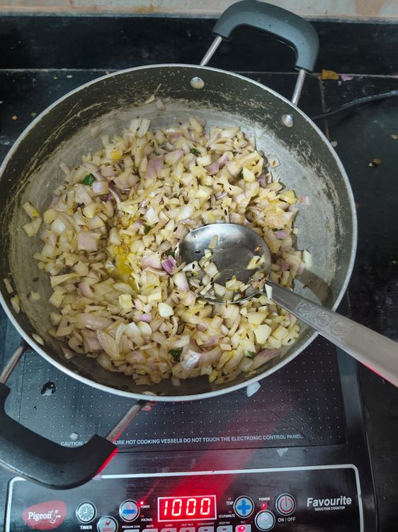 Step 1.1: Add onions and sauté until golden