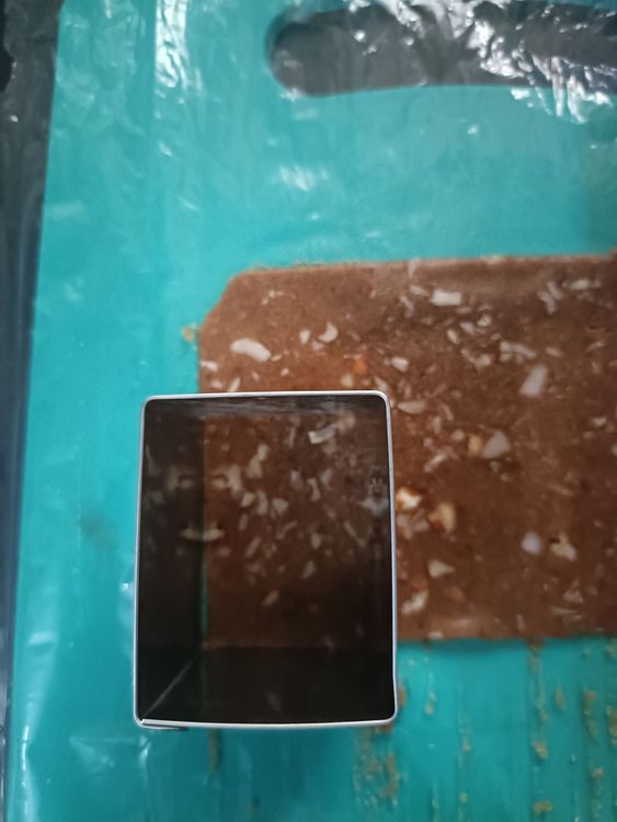 Step 1.1: Cut the uneven edges to form a square and use a cookie cutter to shape the cookies