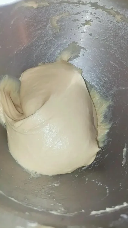 Step 1.2: When all flour has been added and mixed well, add butter and allow to mix for 5 more minutes