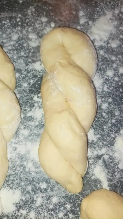 Step 1.1: Place twists on a floured board or parchment paper and allow to rest for 10 minutes