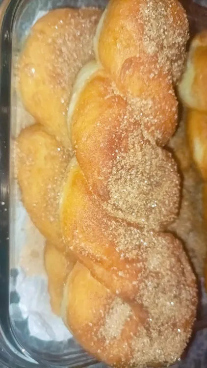 Step 1.1: Dust with cinnamon sugar as soon as they are removed from the oil