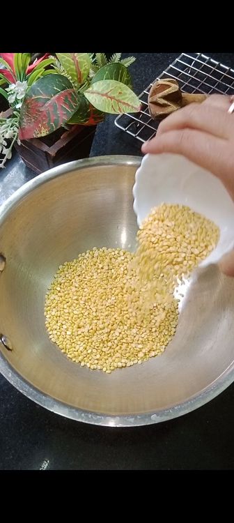 Step 1.1: Roast yellow moong dal on medium heat until it turns golden brown and aromatic
