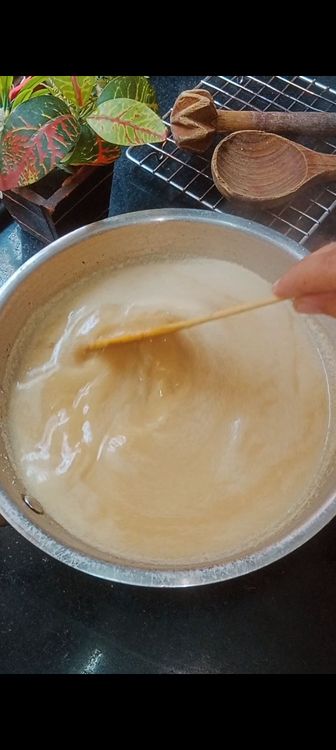 Step 4.3: Once the broth boils lower the flame and add thick coconut milk to enhance the taste of Moong dal Payasam