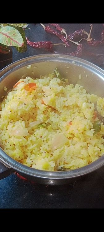 Step 1.2: Once dal rice cooks , switch off the flame keep the lid open and let it settle for few minutes