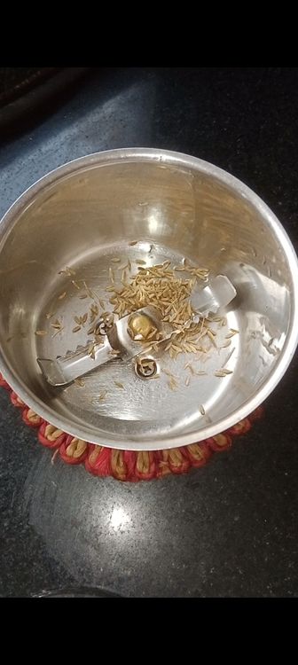 Step 1.1: In a chutney grinder jar , add green chillies, cumin seeds and coriander leaves