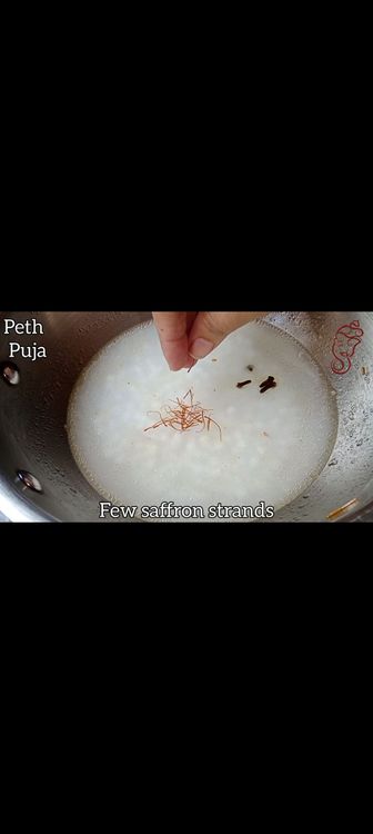 Step 1.3: Heat 1 tbsp ghee in the same pan and add cloves with soaked Sabudana , few saffron strands, 1/2 cup water & roasted vermicelli
