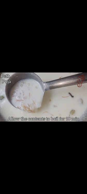 Step 1.3: Once vermicelli cooks , add full cream milk and crushed cardamom pods